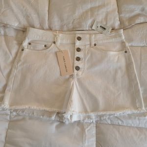 Vince Camuto white denim shorts.